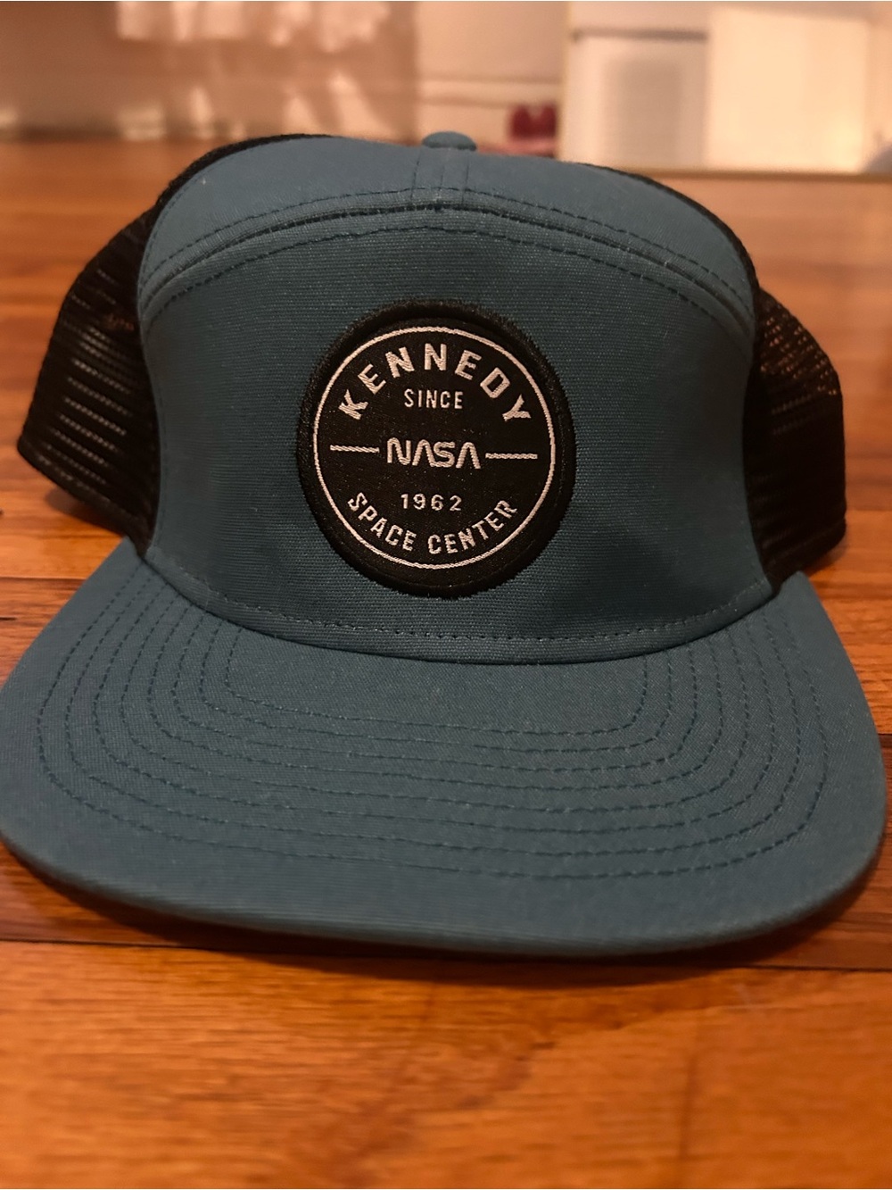 Kennedy Space Center NASA Patch Trucker Hat — Teal & Black